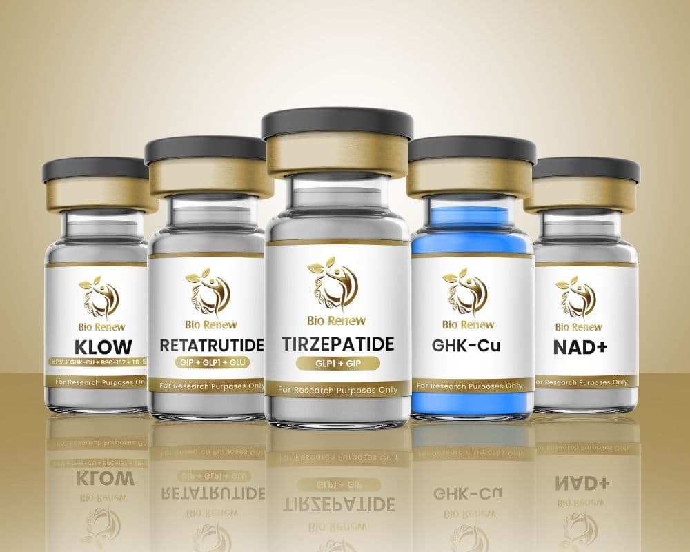 A row of Bio Renew–labeled compound vials used in longevity programs, each marked “For Research Purposes Only,” arranged on a warm gold background.